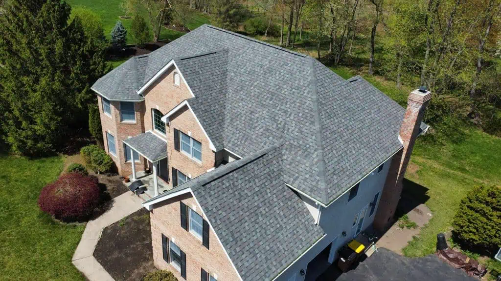 Roofing contractor reviewing Roof Chief Estimator Tool Review and lead management dashboard