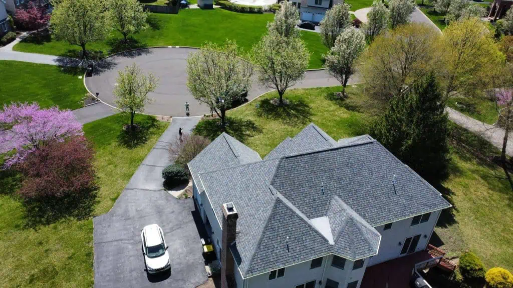 Roofing contractor using RoofSnap Estimator Tool Review aerial measurement app on tablet